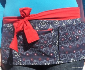 Dance apron prototype with cute red bow.